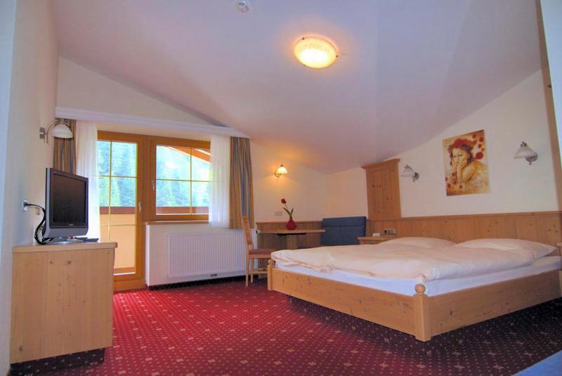 Hotel Garni Forelle Tux Szoba fotó